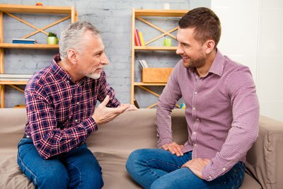 Gender Specific Therapy - two males talking - victory addiction recovery center