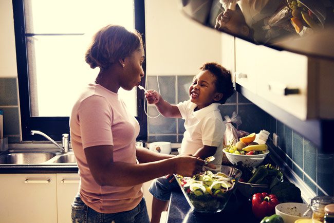 mom and young child in kitchen - healthy foods