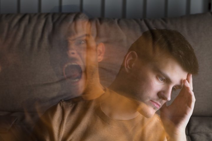 double exposure of sad man and him screaming - addiction and trauma